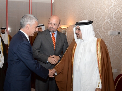 With  Bahrain officials